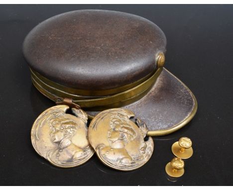 Novelty snuff box, designed as a brass mounted military cap, a pair of Art Nouveau buttons and two gold studs.