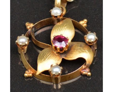 Edwardian 15ct gold pendant, set with a ruby and seed pearls on a box link chain.