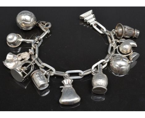 Balinese white metal and enamel bracelet, similar tie pin, a pendant, together with a white metal charm bracelet, another cha