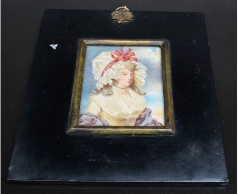 Manner of George Romney,  portrait miniature of a lady in a bonnet, half length, watercolour with body colour, 7.2cm x 5.8cm 
