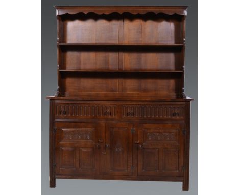 Reproduction oak dresser, two shelf delft rack, base fitted with two frieze drawers over three panel doors, width 137cm.