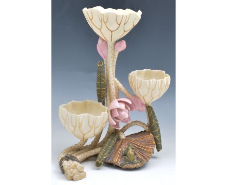 Royal Worcester lotus flower holder centre piece, 1881 with stems and flowers, no 765, restored, 38cm.