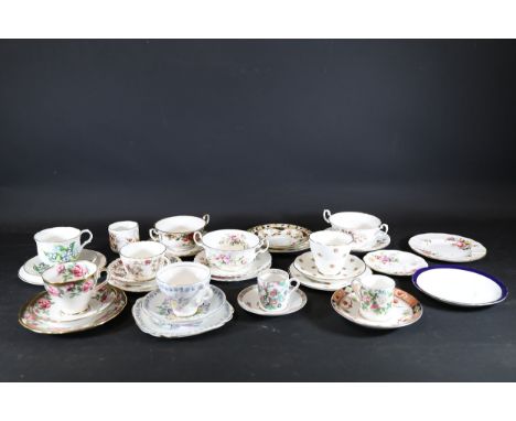 Collection of Porcelain Tea Sets with Floral Motifs and Gilding  This collection of porcelain tea sets features a variety of 