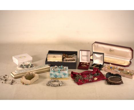Collection of Assorted Jewellery and Decorative Accessories  An assortment of jewellery items displayed in various branded an