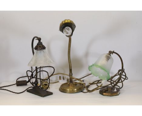 Three Vintage Brass Desk LampsOffered for auction are three exquisite vintage brass desk lamps, each showcasing timeless desi