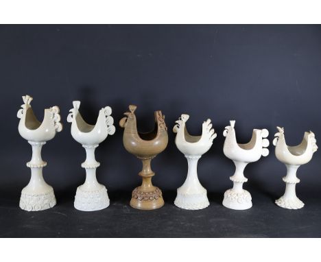 Set of Six Ceramic Rooster Candlestick HoldersA collection of six decorative ceramic candlestick holders designed as stylised