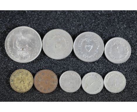 Collection of 20th-Century Middle Eastern CoinsA diverse collection of coins, likely of Persian or Middle Eastern origin, fea