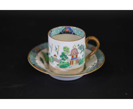 Chinese Willow Pattern Porcelain Collection Including Teacup with Saucer and Decorative PlatesThis exquisite collection featu