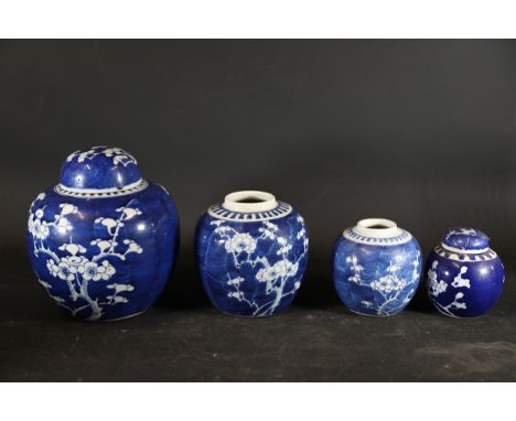 Set of Four Chinese-Style Porcelain Ginger JarsA collection of four porcelain ginger jars featuring traditional Chinese "prun