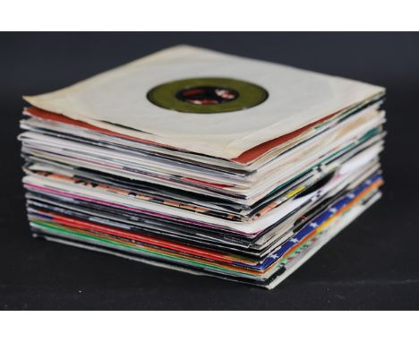 **Collection of 7-Inch Vinyl Singles Featuring Diverse Genres and Iconic Labels**  A group of 12 vintage 7-inch vinyl singles