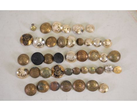 **Collection of Vintage Military Uniform Buttons**  A grouping of 40-50 vintage military uniform buttons in varied sizes, mat