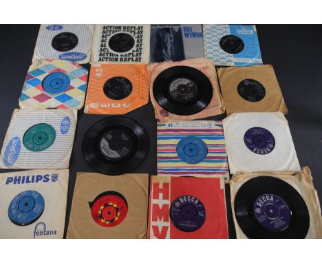 **Collection of Sixteen 7-inch 45 RPM Vinyl Records by Various Brands**A varied collection of 16 vintage 7-inch vinyl records