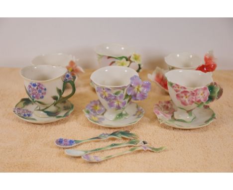 Franz Porcelain Cups and Saucers Set  A set of six vintage-style ceramic Franz cups and saucers accompanied by three matching