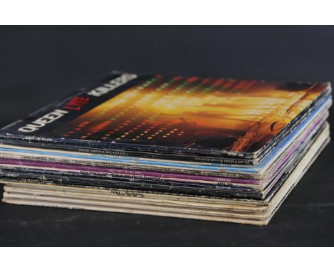 Collection of 17 Vintage 12-Inch Vinyl Records Featuring Iconic AlbumsThis collection comprises 17 vintage 12-inch vinyl reco