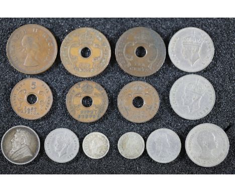 Collection of British and Commonwealth CoinsThis group consists of 13 coins from various regions and periods of the British E