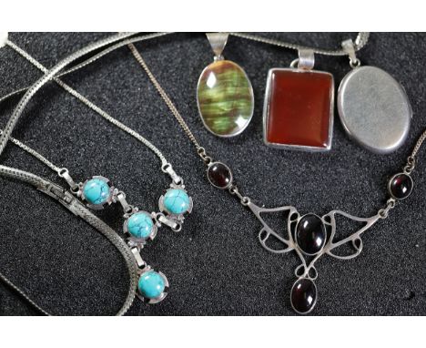 Collection of Silver and Semi-Precious Stone JewelleryA collection of silver and silver-tone jewellery featuring pendants, ch
