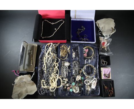 Collection of Assorted Jewellery and Accessories  A collection of assorted jewellery and accessories, primarily stored in a n