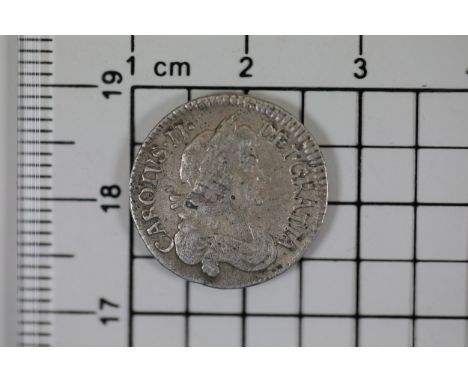 **1679 Charles II Silver Maundy Threepence**  A silver Maundy threepence coin dated 1679, issued during the reign of King Cha