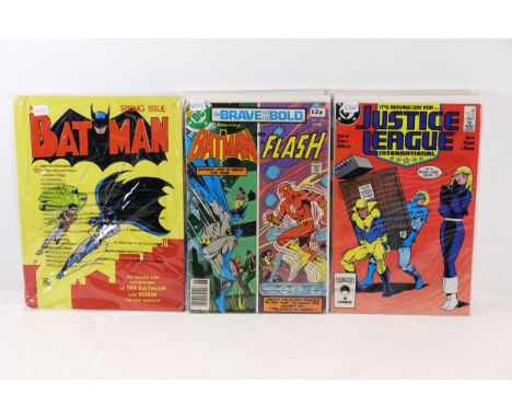 Justice League and Batman Comics with Batman Wall PlateThis collection includes 16 mixed vintage comic books featuring Justic