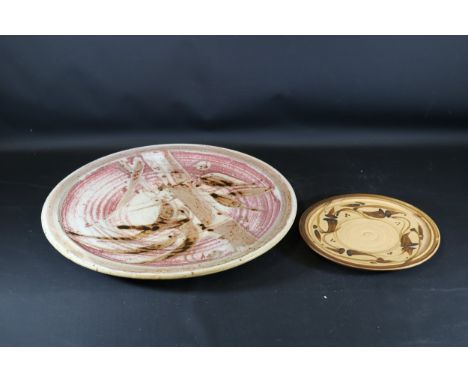 **Peter Vost Signed Ceramic Plates with Abstract and Detailed Patterns**These two striking ceramic plates, designed and likel
