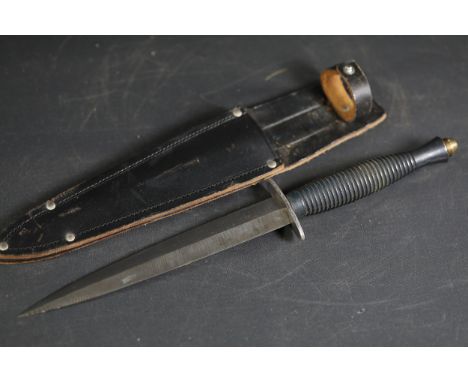 **Third Pattern Fairbairn-Sykes Style Black Commando Knife and Sheath**A Third Pattern Fairbairn-Sykes (F-S) style fighting k