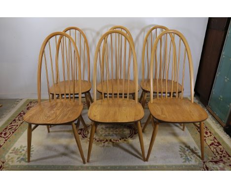 Set of Six Ercol Windsor Quaker Dining Chairs, 1980s  A collection of six Ercol Windsor Quaker dining chairs crafted from sol