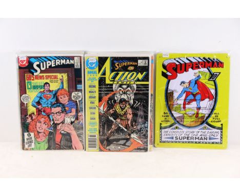 Collection of 28 Vintage Superman Comics and Metal Wall PlateThis collection includes 28 vintage Superman comics, primarily f
