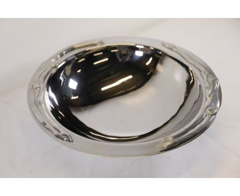 Carrol Boyes Polished Metal Fruit Bowl with Sculptural RimA distinguished fruit bowl crafted by renowned designer Carrol Boye