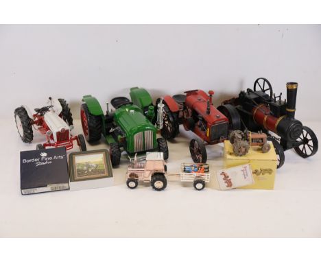 Collection of Model Tractors ornaments and Steam Engine The collection consists of intricately detailed model ornaments, feat