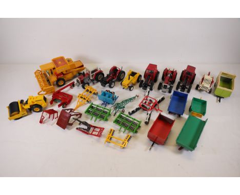 Collection of Britains Die-Cast Toy Tractors and Farming EquipmentThis selection comprises a variety of die-cast toy tractors