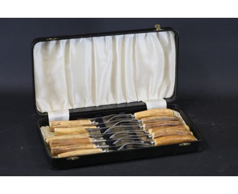**Hamilton Laidlaw Ltd. Stag Horn Handled Knife and Fork Set in Presentation Case**  A complete set of six knives and six for