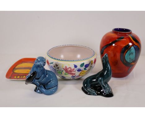 Poole Pottery Decorative Ceramic Collection  A collection featuring five vibrant Poole Pottery pieces:  1. **Red Square Dish*
