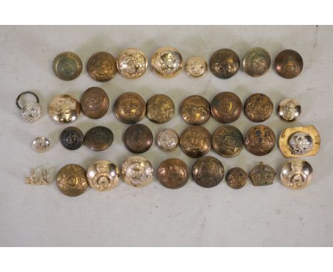 **Collection of 35 Assorted Military Buttons Featuring Various Regimental Insignias and Emblems**This collection comprises 35