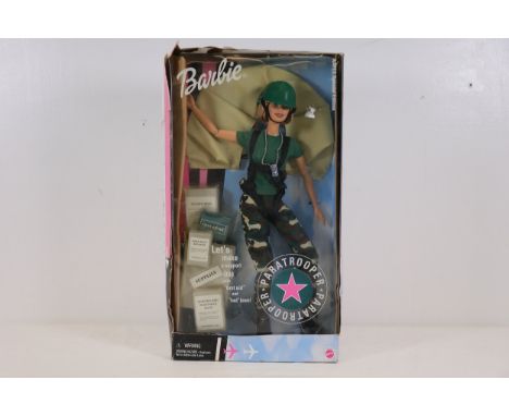 **Mattel Paratrooper Barbie - Armed Services Special Edition**  This is a themed Mattel Barbie doll from the Armed Services S