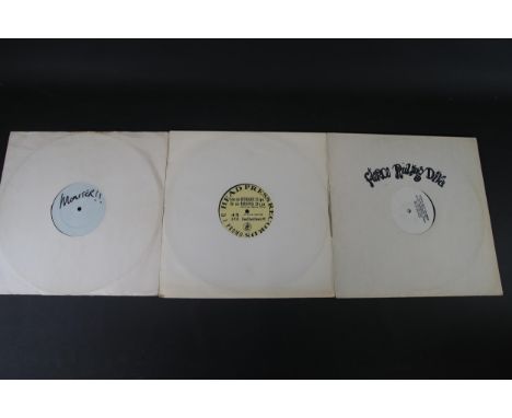 **Group of Three 12" Vinyl Records: Promotional and Test Pressings**A collection of three 12-inch vinyl records, each with un