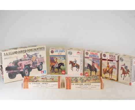 **Collection of Vintage Model Kits: Tamiya, Airfix, and Historex**A set of vintage model kits featuring military themes, incl