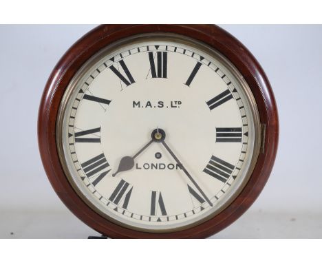 British Wall Clock with Fusee Mechanism and Additional Clockwork Components  A vintage British wall clock marked "M.A.S. LTD"