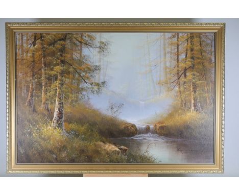 Framed Oil Painting by Roy Wilson  A framed oil-on-canvas painting by Roy Wilson, depicting a serene autumn woodland landscap