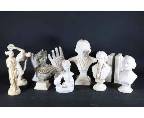 Collection of Decorative Busts, Figurines, and Sculptural Items  This collection includes diverse decorative sculptures, feat