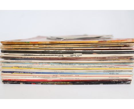 Collection of Elvis Presley Vinyl RecordsA curated collection of over 30 Elvis Presley 12-inch vinyl LPs, accompanied by sing