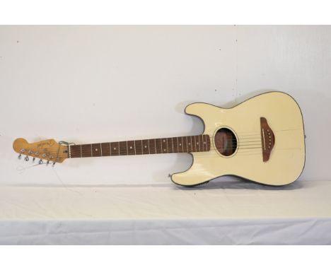**Fender Stratacoustic Guitar with 4-Band EQ**This is a cream-coloured Fender Stratacoustic guitar, featuring the distinctive
