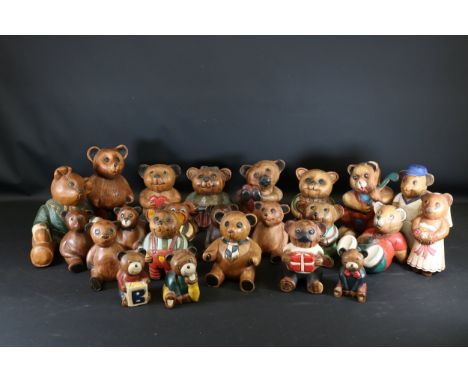 Collection of Hand-Carved Wooden Teddy Bear FigurinesThis charming collection features hand-carved wooden teddy bear figurine