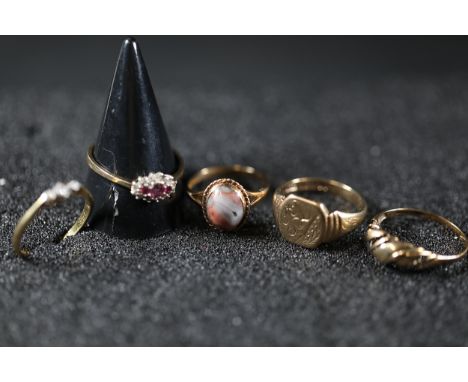 Collection of Five Gold Rings10.77g (including stones) 9CT2.17g (including stones) 22CTThe collection comprises five distinct