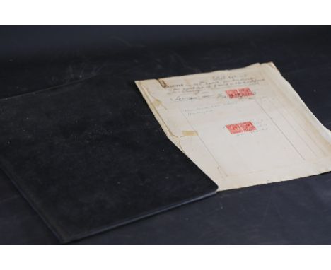 **Vintage Stamp Collection and Historical Document**  This lot features two items of historical and philatelic significance: 