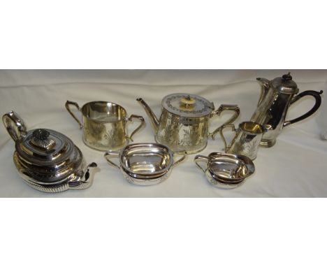 A plated three piece oval Teaset engraved with bull rushes and water birds, by Walker and Hall, an engraved plated oval teapo