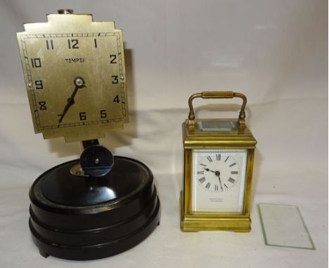 A French Carriage Clock with white dial inscribed 'Bright & Son Limited, Scarborough' with gong strike in brass and bevelled 