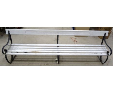 A white painted lattice and scrolled wrought iron Railway Platform Bench.  10' 3" (312cms) long.  The bench came from Levensh