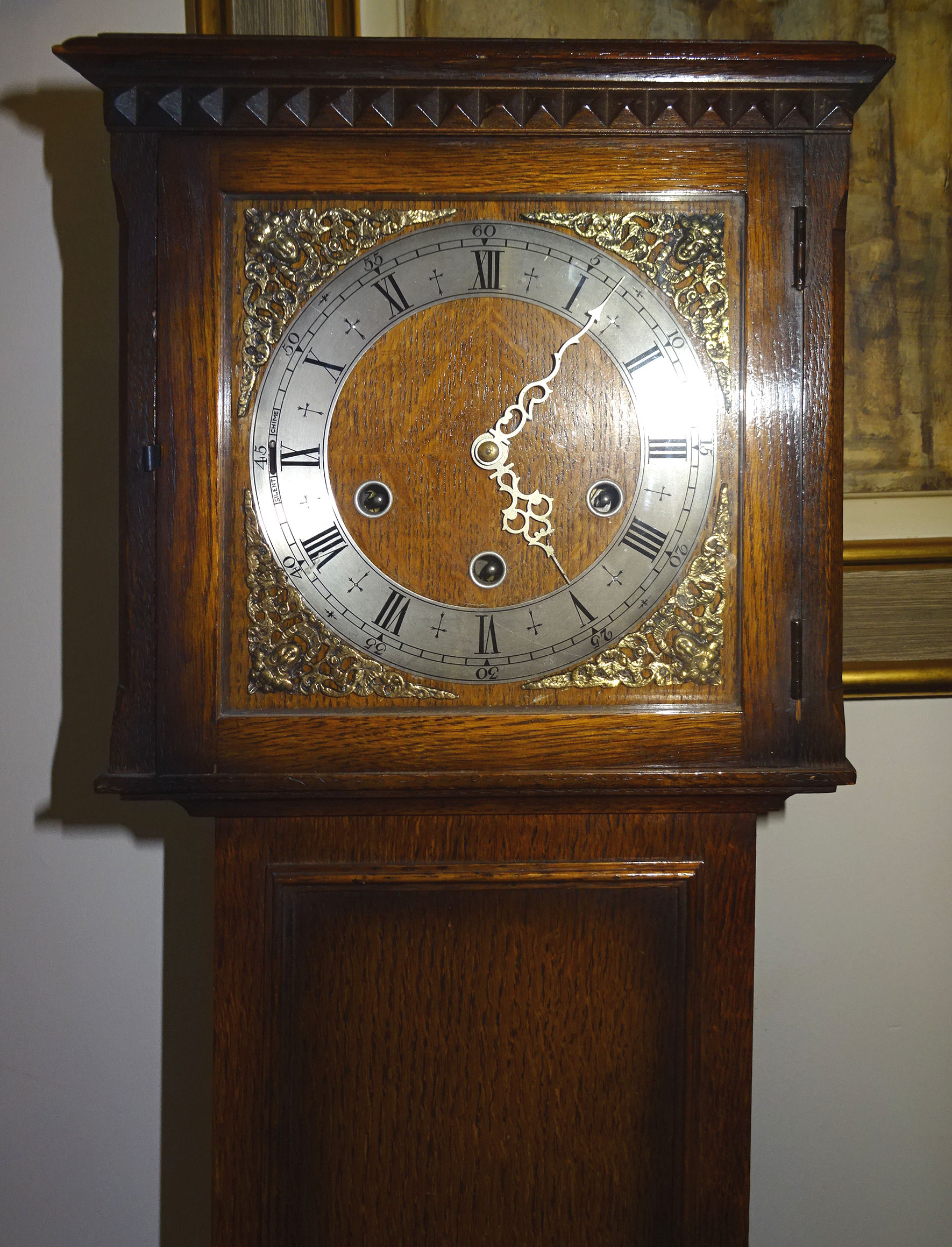 A Grandmother Clock with steel and brass dial and striking movement in