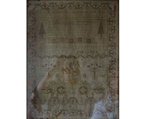 An early 19th Century Needlework Sampler by Caroline Freeman with verse, trees, birds etc, dated 1824.  16" (41cms) x 17" (43