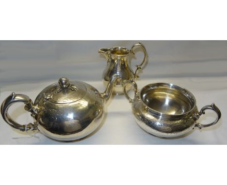 An early Victorian Bachelor's silver Teapot with engraved decoration and bud lift, London, 1842, together with a similar suga